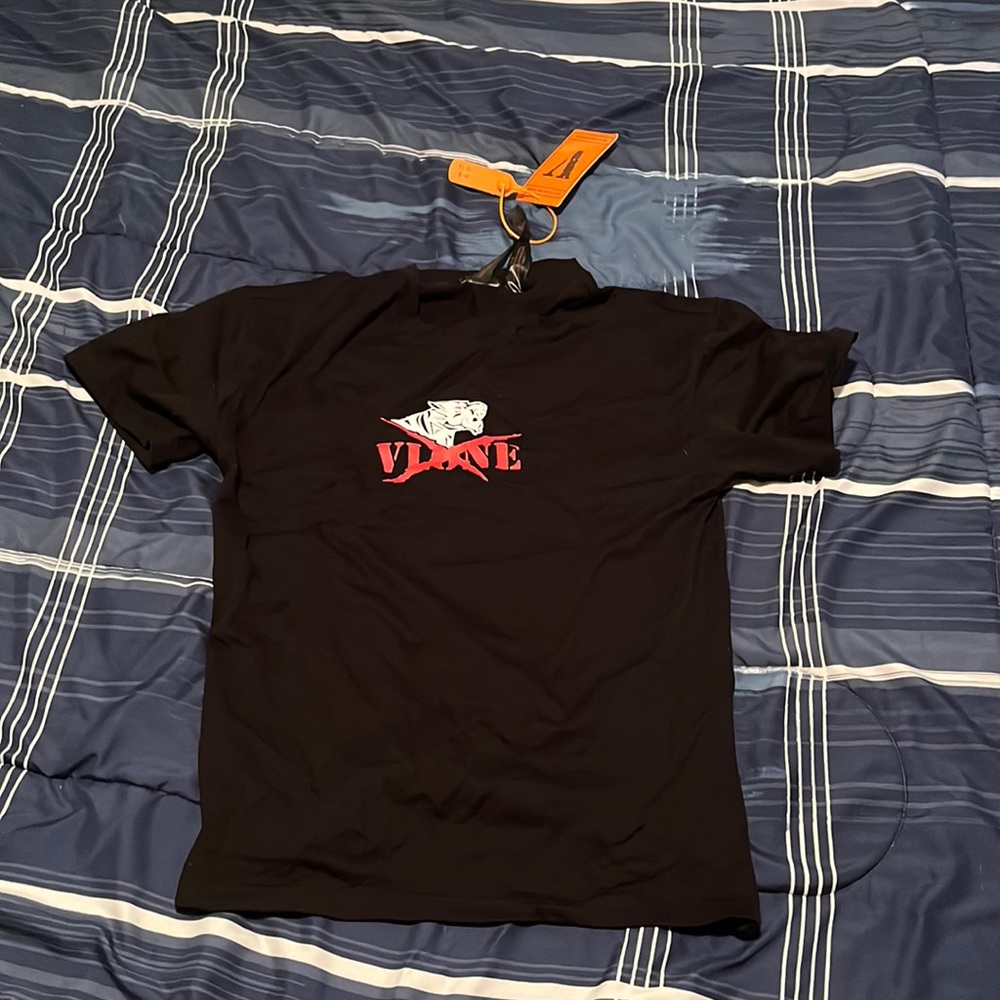 This is a vlone tshirt it is red and black size medium in mens